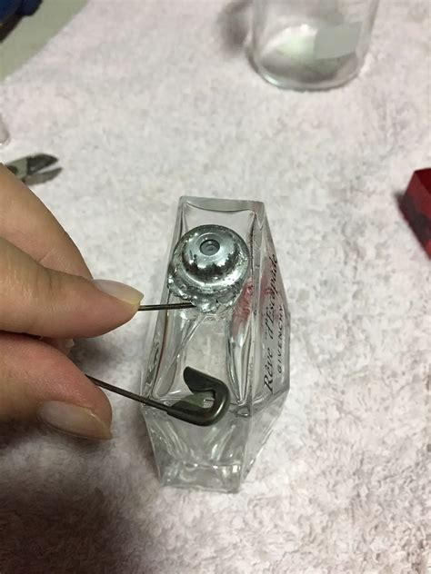how do you open a perfume bottle without breaking it